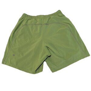 LULULEMON PACE BREAKER LINED 7" SMALL LIKE NEW GREEN